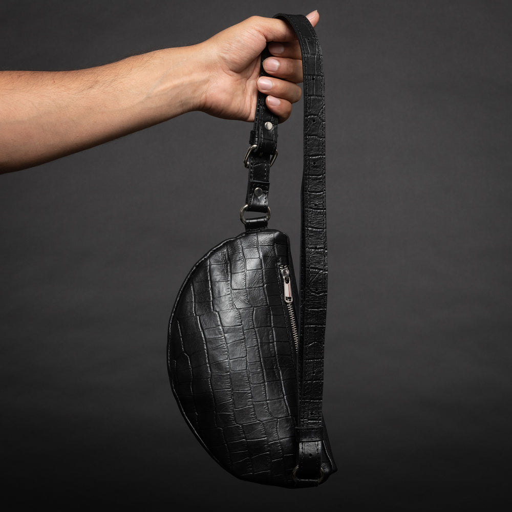 backside of black leather fanny pack