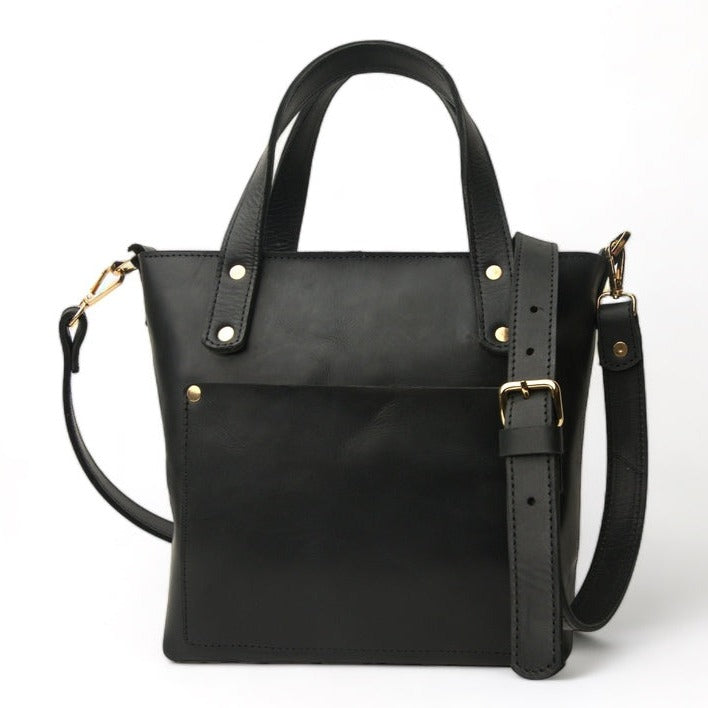 black leather tote bag with golden hardware