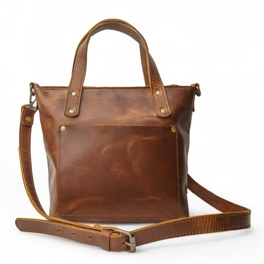 saddle brown small leather tote bag with removable adjustable crossbody strap
