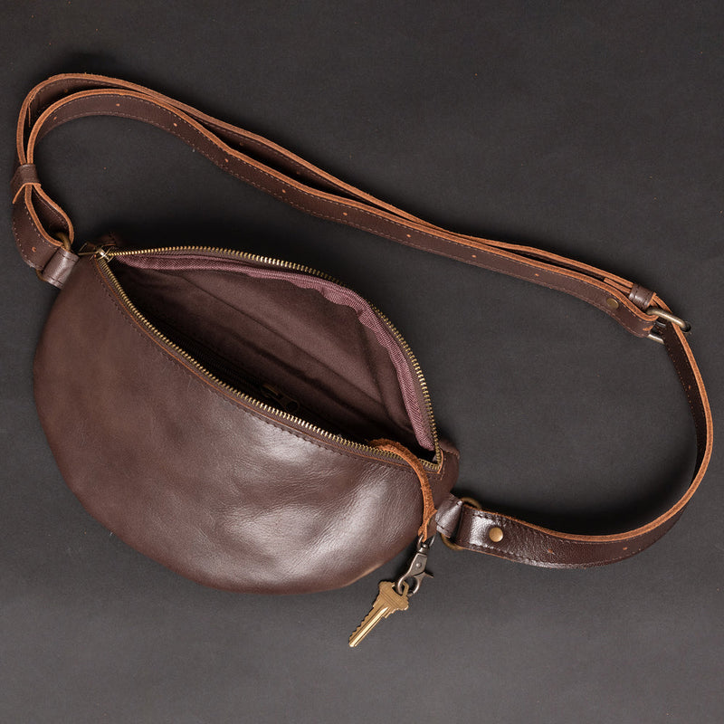 darl brown fanny pack with key loop hanging outside